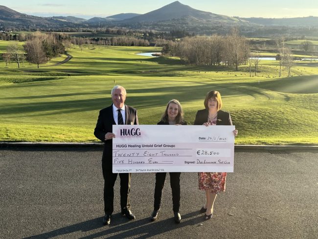 Dun Laoghaire golf club presenting of cheque to Fiona Tuomey