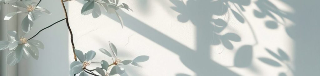 while flowers with show image on wall