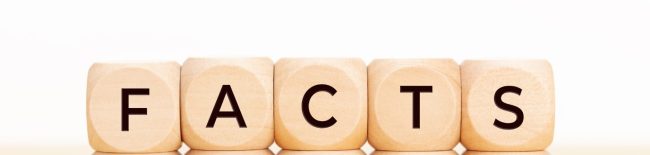 square blocks with letters on them that spell facts to represent facts about suicide