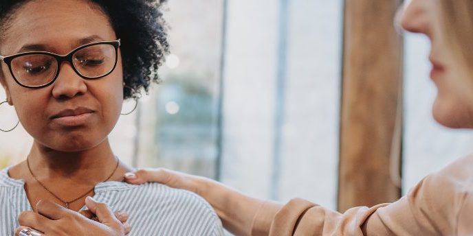 how you might feel after a suicide 1438×344 website woman with eyes closed and hands on chest with another hand on her shoulder. how you might feel after a suicide