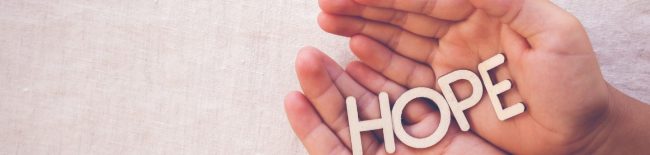 hands with the words hope held within it to signify hope after suicide