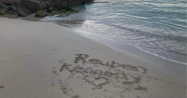 remembering Reuben his name is written in the sand