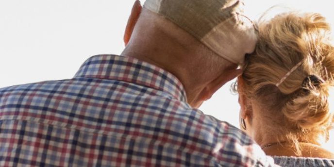 helping someone after a suicide 1438×344 website elderly couple with arm around one person showing support after suicide