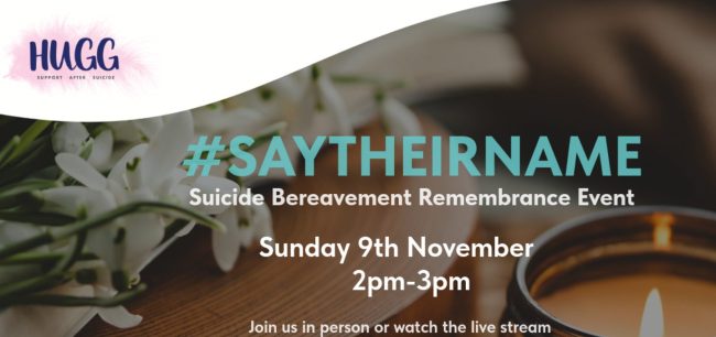 Flowers and a candle for Say Their Name Suicide Bereavement Remembrance event