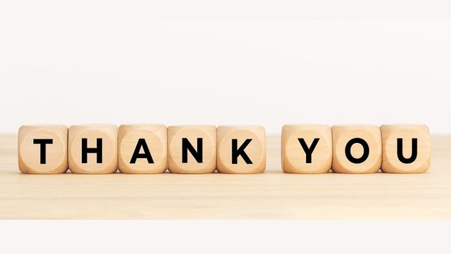 the words thank you write on blocks