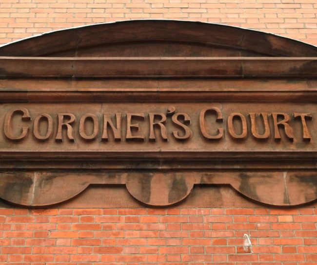 Outside the building of the Coroners Court