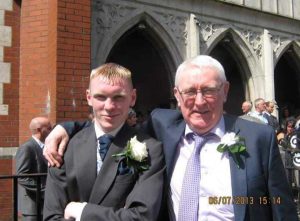 Sean and his dad Tom outside a church at a wedding