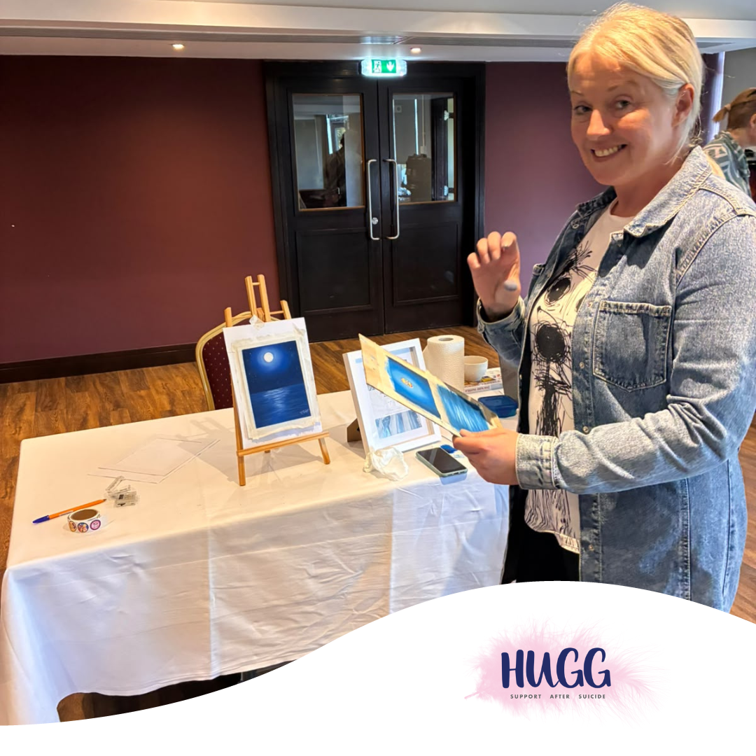 image of one of our members holding her finished piece