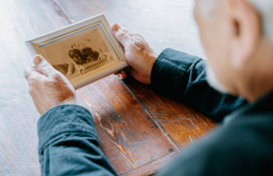 man staring at a photo